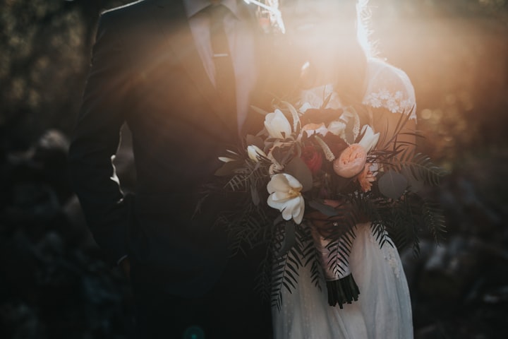 A bride and groom embracing on their wedding day